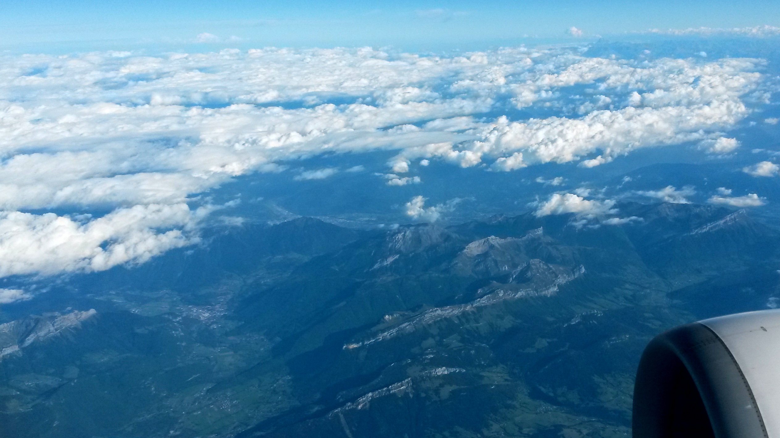Clouds over the Alps on the plane to here